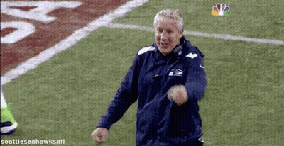 Man In Seattle Seahawks Jacket On Football Field GIF