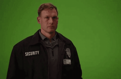 Man In Security Jacket With Word Security GIF