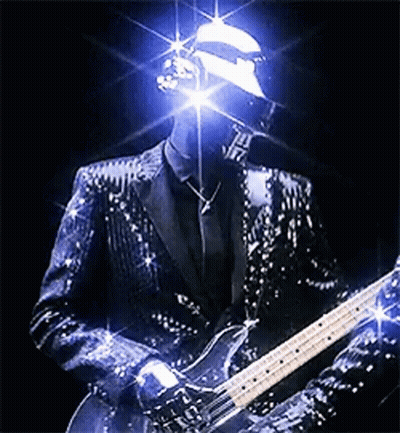 Man In Sequined Suit Playing Guitar GIF