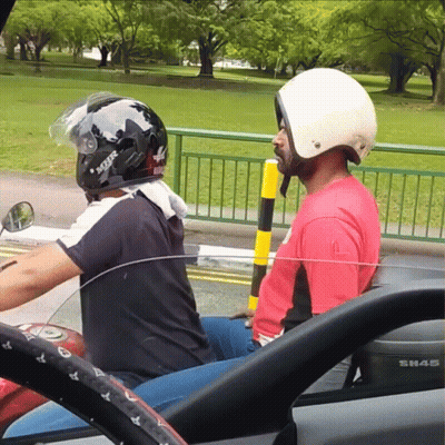 Man In Shark Helmet Sitting In Car GIF