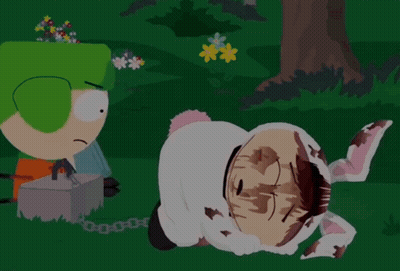 Man In Sheep Costume Laying On Ground GIF