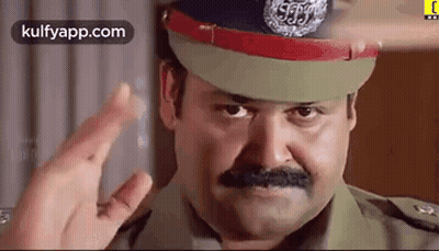 Man In Sheriff Uniform Carrying Trash Bag GIF