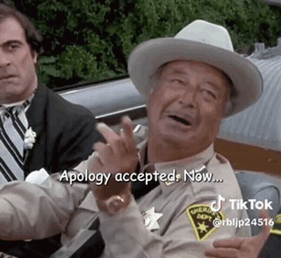 Man In Sheriff Uniform Says Apology Accepted GIF