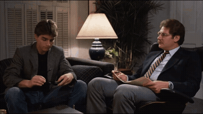Man In Shirt And Socks Dancing By Stairs GIF