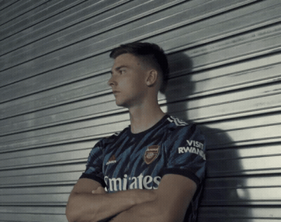 Man In Shirt Saying Emirates GIF