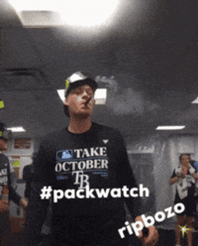 Man In Shirt Saying Take October TB Smoking Cigar GIF