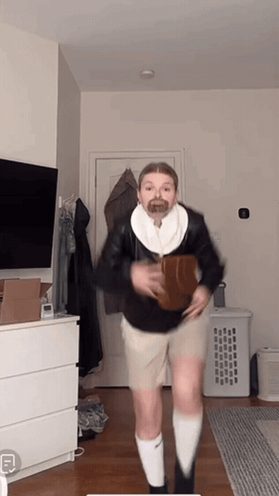 Man In Shorts And Socks Jumping GIF