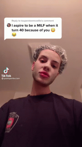 Man In Shower Cap Aspires To Be A MILF At 40 GIF
