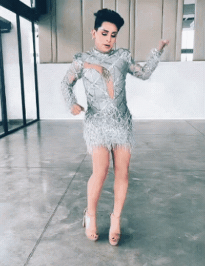 Man In Silver Dress And Heels Dancing GIF