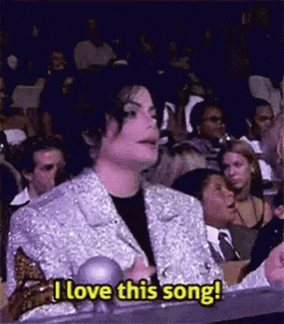 Man In Silver Jacket Saying I Love This Song GIF
