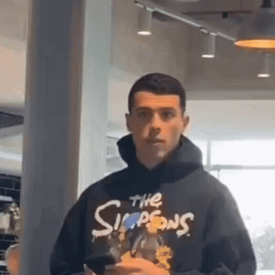 Man In Simpsons Hoodie GIF