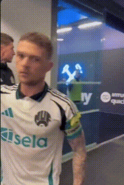 Man In Sisela Jersey In Front Of Window GIF