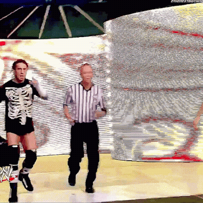 Man In Skeleton Costume Dancing With Referee GIF