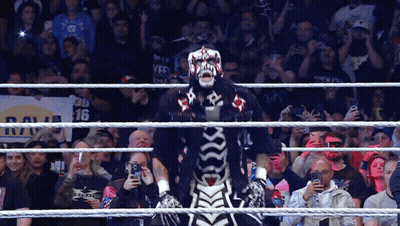 Man In Skeleton Costume With Raw 16 Sign GIF