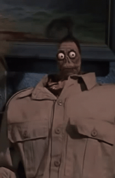 Man In Skeleton Mask And Tan Shirt GIF