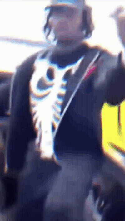 Man In Skeleton Shirt And Hat GIF