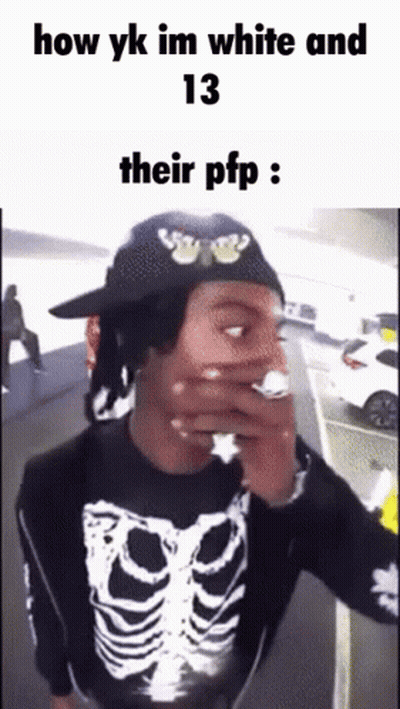 Man In Skeleton Shirt Covering Mouth GIF