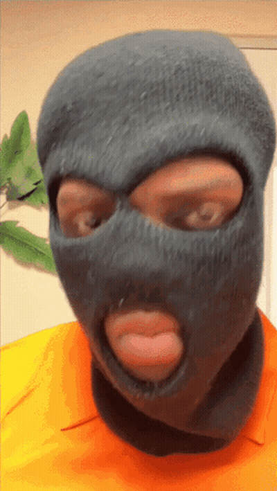 Man In Ski Mask Tongue Out GIF