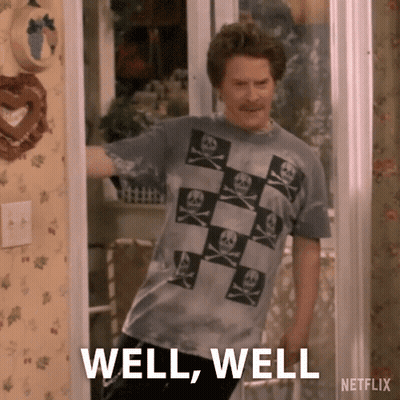 Man In Skull And Crossbones T-Shirt In Doorway GIF
