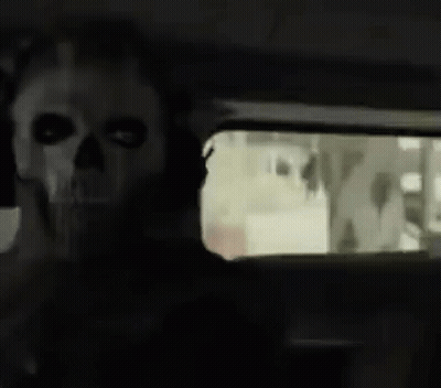 Man In Skull Mask And Headphones GIF