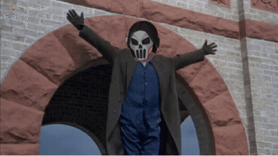 Man In Skull Mask And Headphones In Brick Archway GIF