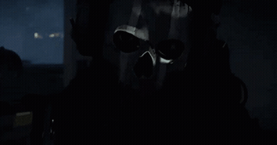 Man In Skull Mask And Headphones In Car GIF