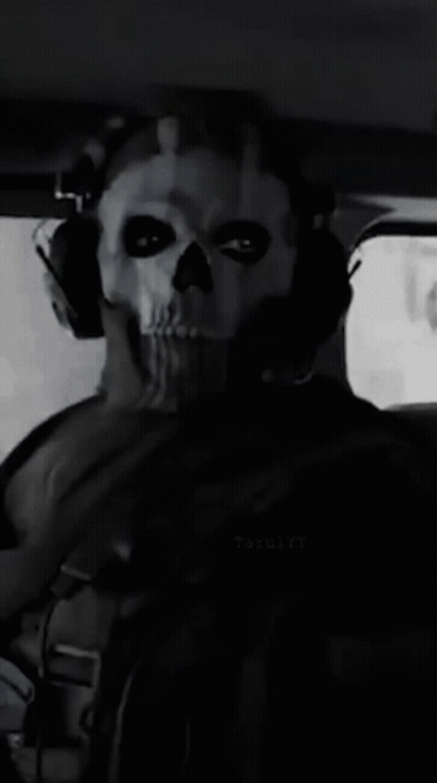 Man In Skull Mask And Headphones In Car GIF