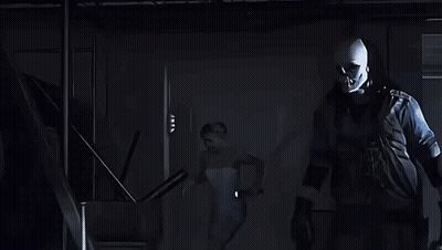 Man In Skull Mask Standing Next To Woman In White Dress GIF