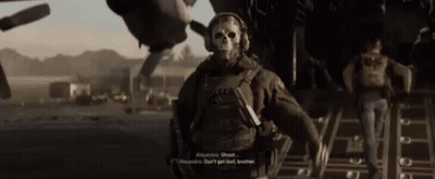 Man In Skull Mask Talking To Another Man GIF