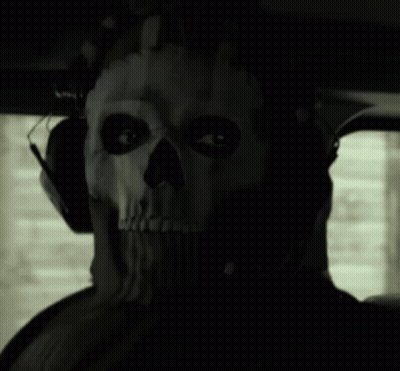 Man In Skull Mask With Headphones GIF
