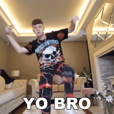 Man In Skull Shirt Dancing In Front Of Couch Saying Yo Bro GIF