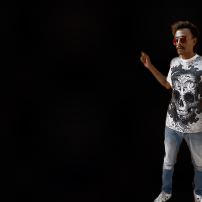 Man In Skull Shirt Pointing At Type GIF