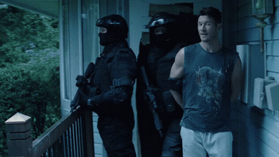 Man In Skull Tank Top Arrested By Police GIF