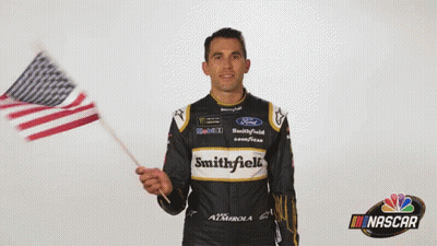 Man In Smithfield Jersey Holding American Flag GIF