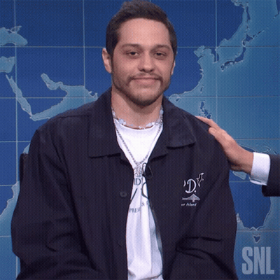 Man In SNL Jacket Patted On Shoulder GIF