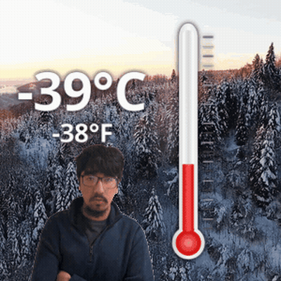 Man In Snowy Forest With Thermometer 39 Degrees Celsius GIF