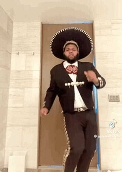 Man In Sombrero And Suit Dancing GIF