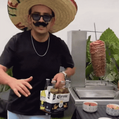 Man In Sombrero And Sunglasses Holding Corona GIF