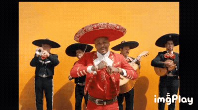 Man In Sombrero Dancing With Mariachis GIF