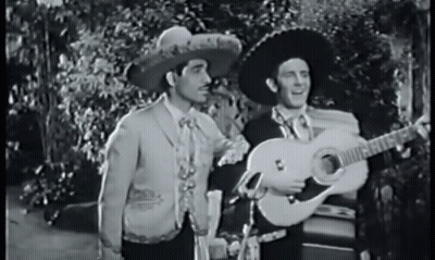 Man In Sombrero Holding Guitar GIF