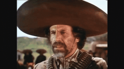 Man In Sombrero Holding Gun GIF
