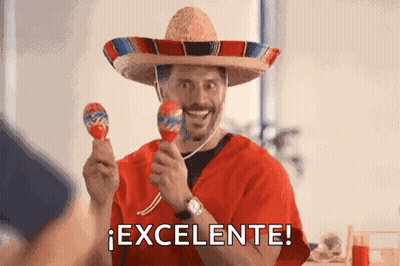 Man In Sombrero Holding Two Maracas GIF