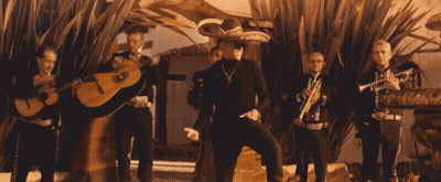 Man In Sombrero In Front Of Band GIF
