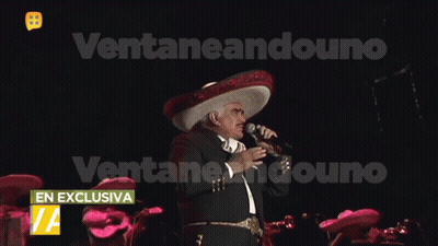 Man In Sombrero Singing Into Microphone GIF