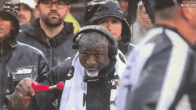 Man In Sony Headset Stands In Rain GIF