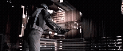 Man In Space Suit By Curtain GIF