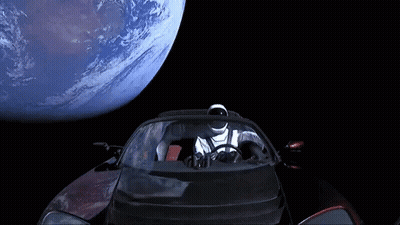 Man In Space Suit Driving Car With Earth GIF