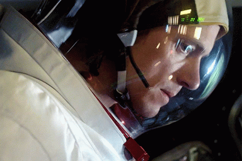 Man In Space Suit Helmet Says 7:50 GIF