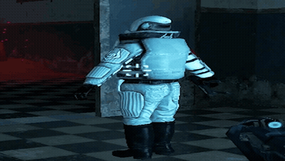 Man In Space Suit In Checkered Room GIF