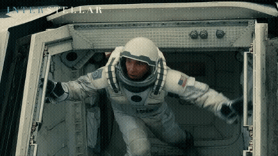 Man In Space Suit Jumping From Spaceship Interstellar GIF